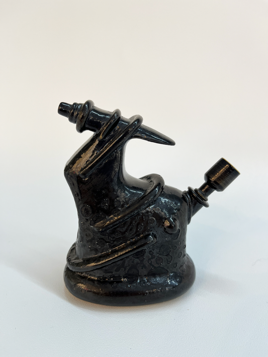 Pipa negra de cerámica
